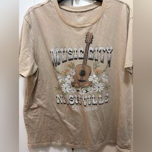 Music city Nashville short sleeve tee. Tan vintage look, large